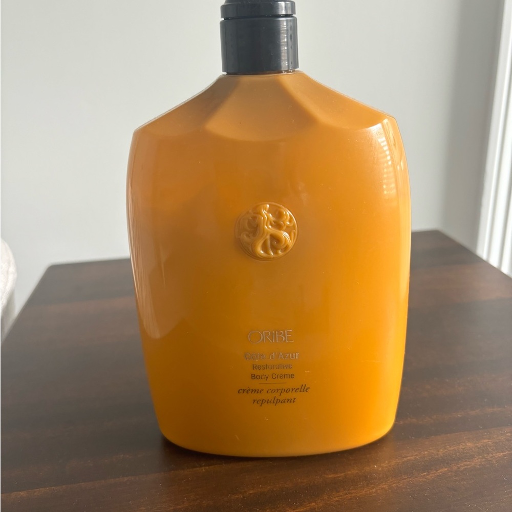 Oribe Côte d’Azur body lotion large restorative cream.